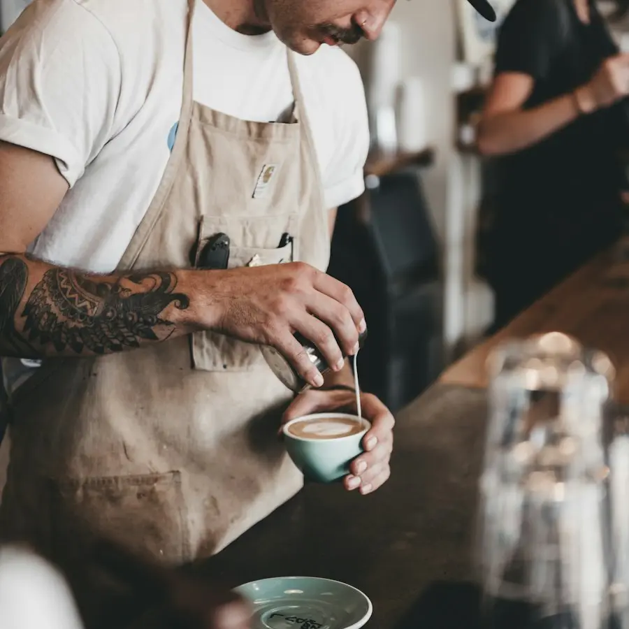 Danny pouring latte art