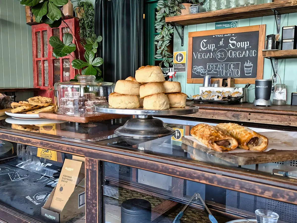 The bakery counter full of pastries and bread